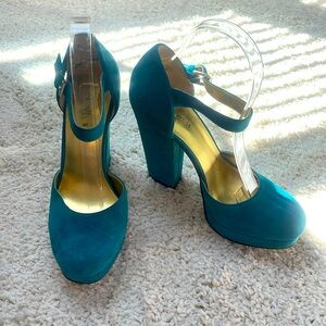 Nine West peacock blue round toe block heels.
